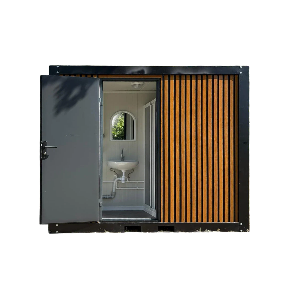 Interior front view of a portable bathroom unit with open door