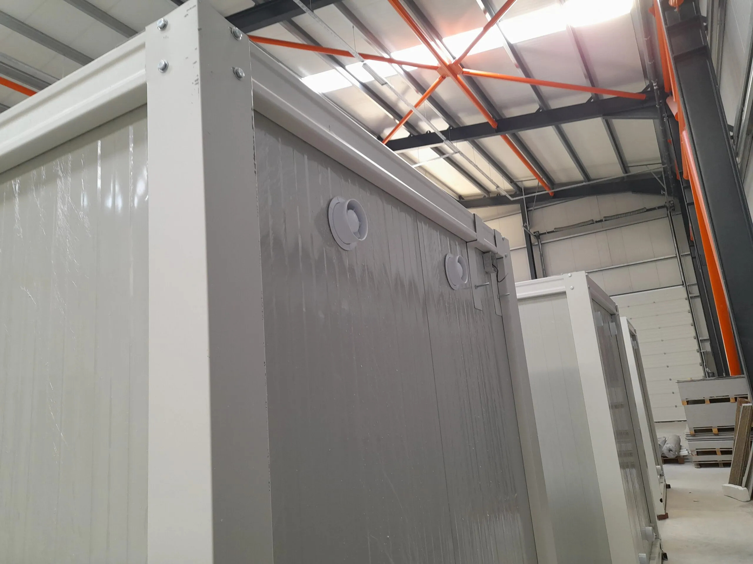 Electrical ventilation inside a portable toilet and shower unit