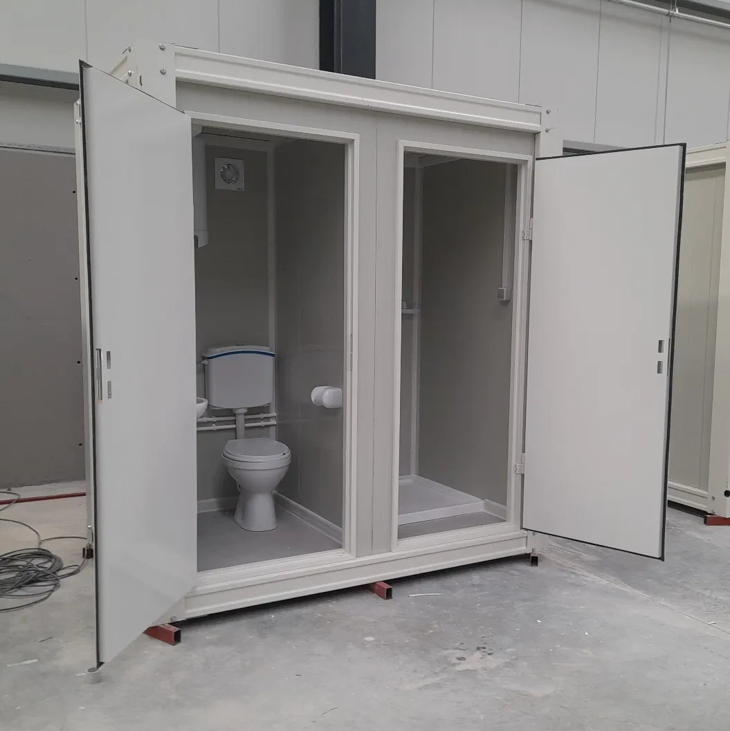 Front view of a portable toilet and shower unit with open doors