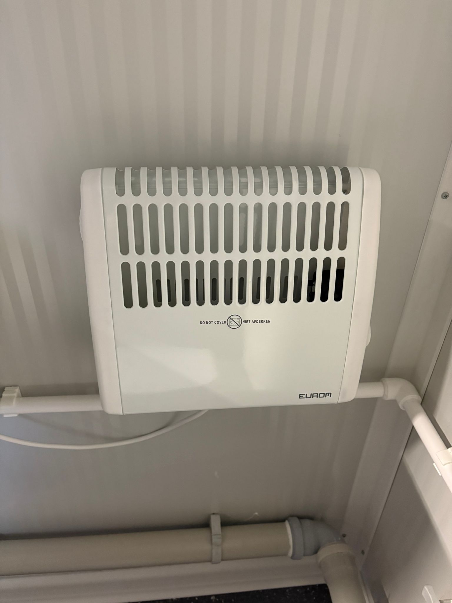 Verwarming in een dubbele toiletunit.