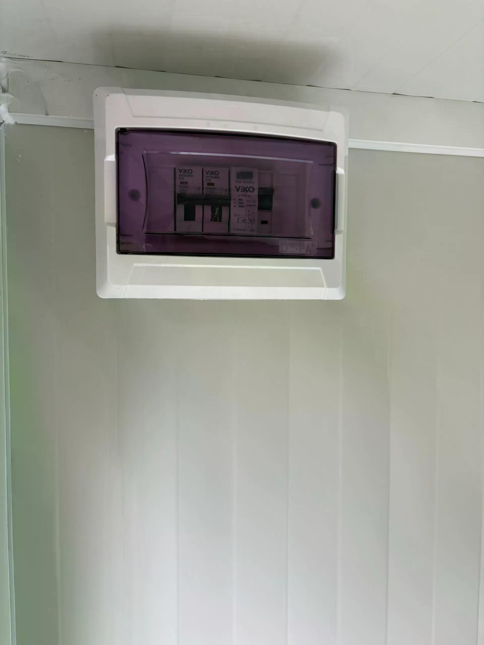 Dual portable shower unit fuse box