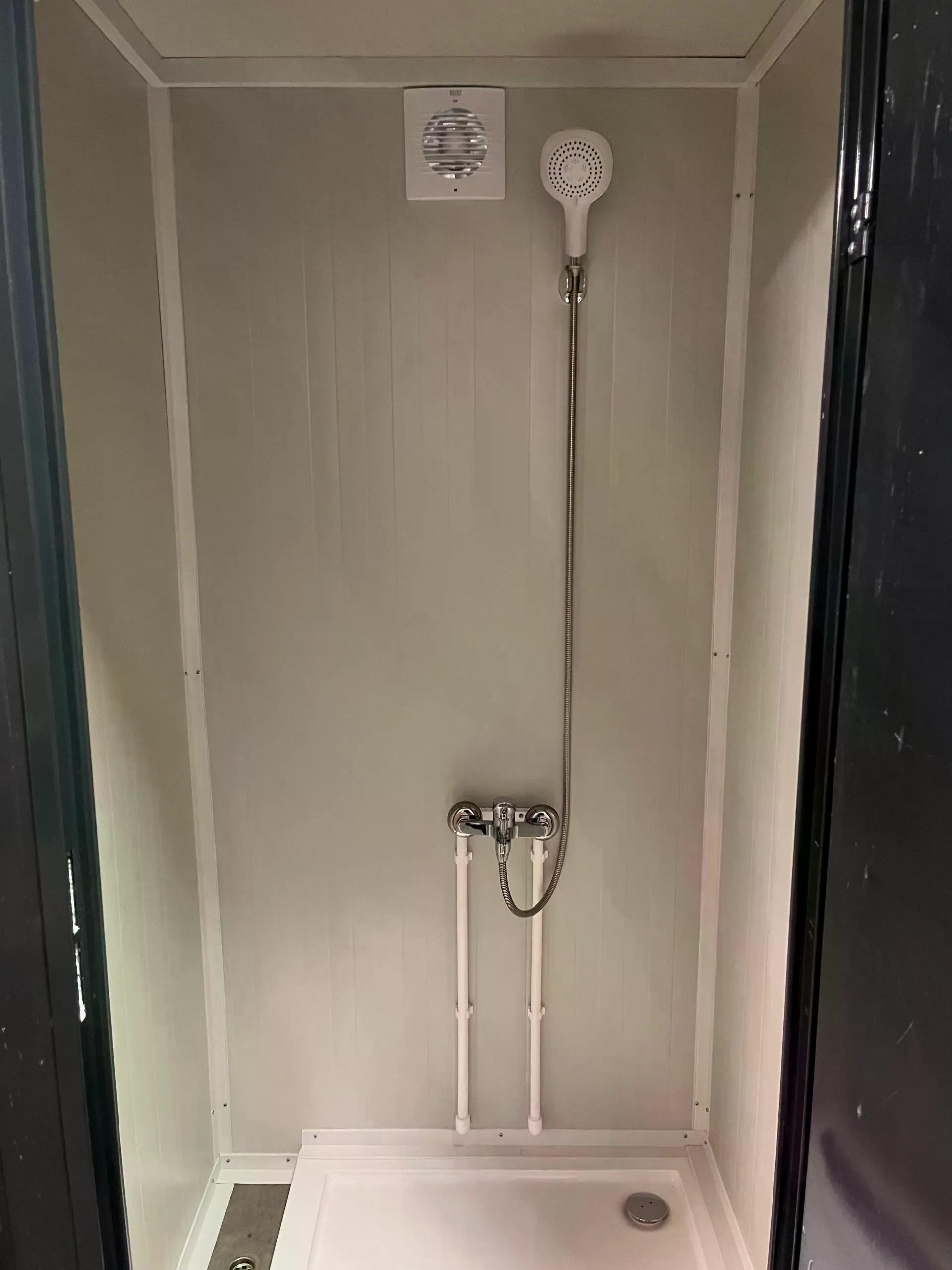 Dual portable shower unit interior