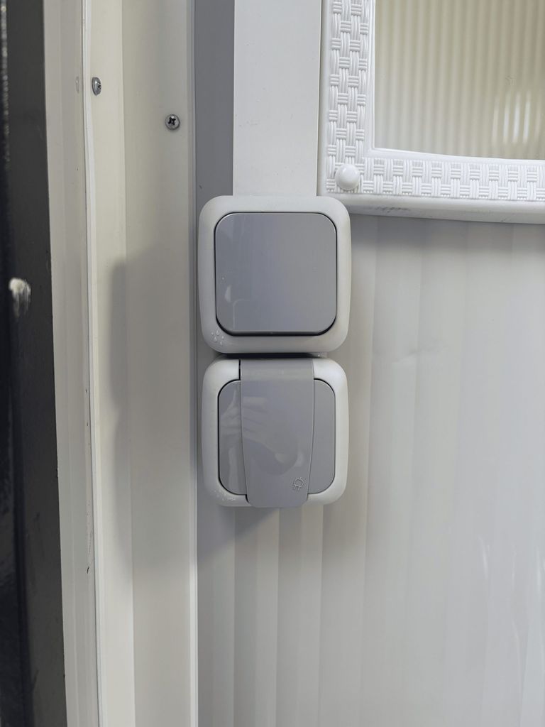 Light switch inside a portable toilet unit for camping